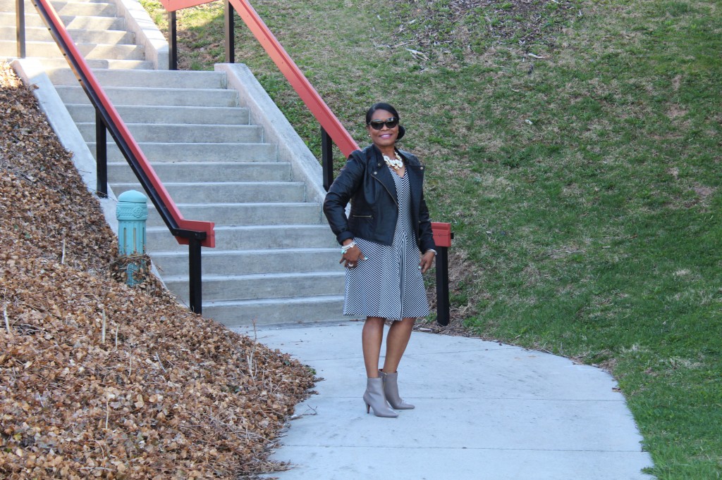 Wearing:  Macy's Impluse Faux Leather Moto Black Jacket, Stella and Dot Dot Bloom Necklace, Banana Republic Fit and Flare Dress, and Nine West Junia Taupe Bootie.