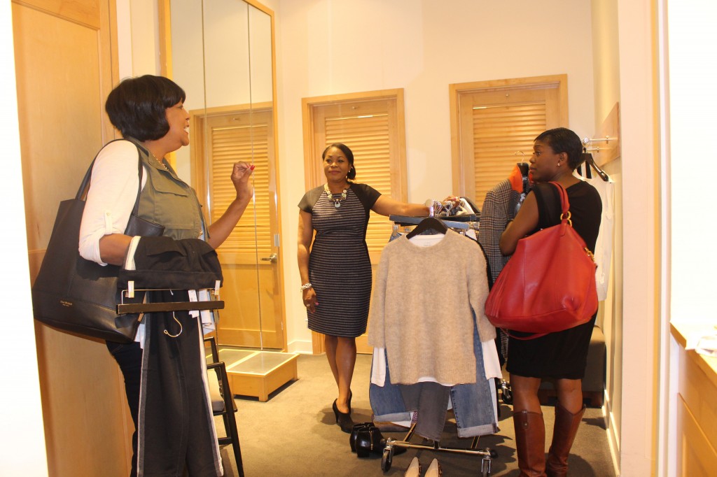 Discussion on fitting of stripe dress on me with Cynthia and stylist, Toi Sweeney.