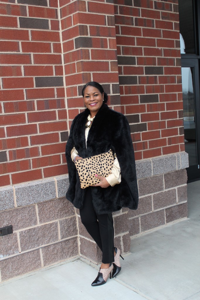 Wearing Vince Camuto faux fur cape, old necklace of ivory and brass, Lafayette 148 silk blouse, J. Crew Factory leather-stripe Gigi pant, Etsy: 2chicdesigns calf-hair leopard print clutch, Enzio Angiolini bootie.