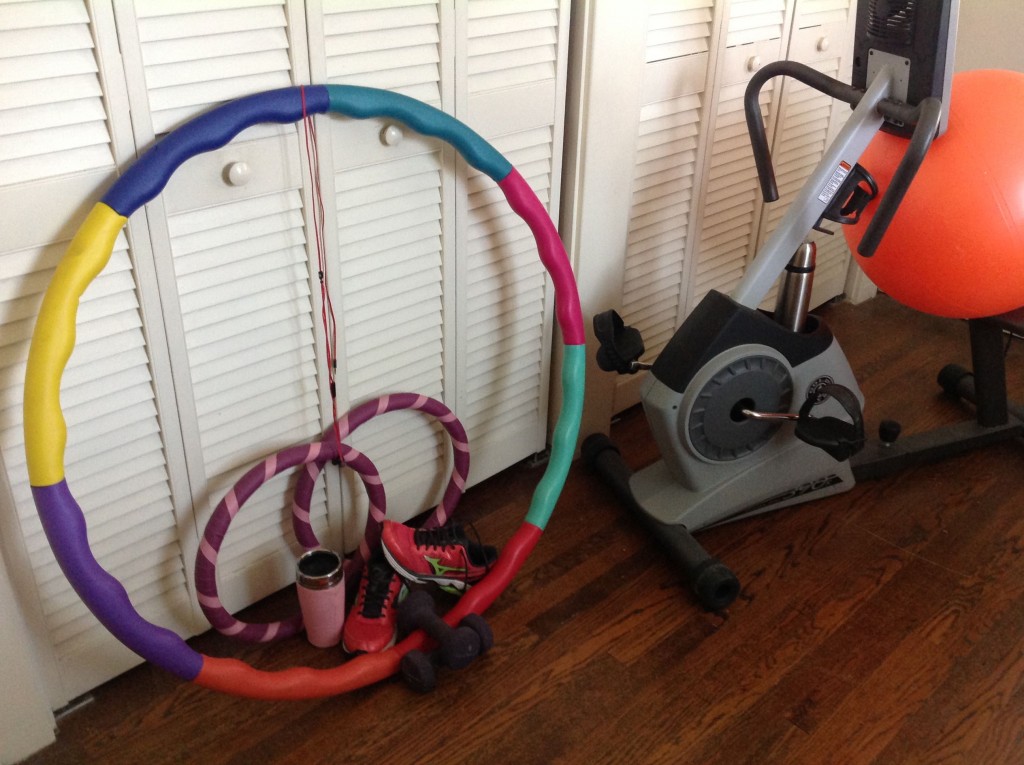 My fitness equipment: water bottle, arm weights, weighted hula hoop, sneakers and Beat By Dre ear buds