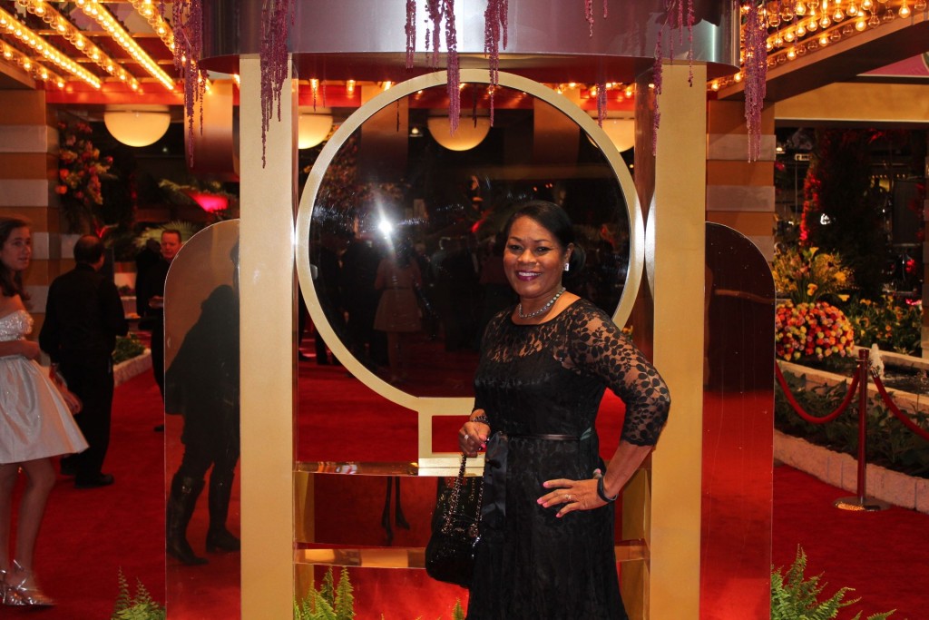 at the 2015 Philadelphia Flower Show. Wearing Teri Jon black lace cocktail dress, Kate Spade chain bag, Stuart Weitzman evening pumps, Wolford Neon 40 tights and necklace