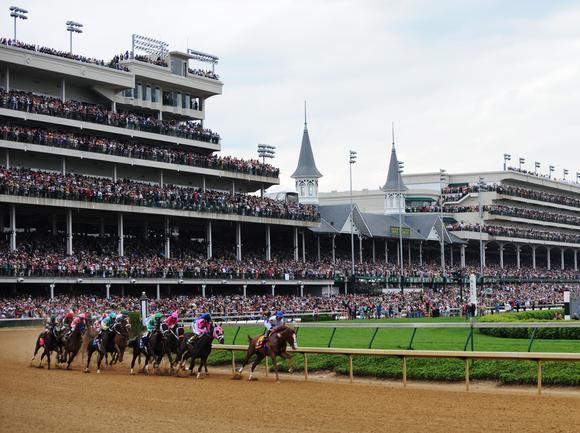 Horses coming around the first turn at the 137th running of the Kentucky Derby.