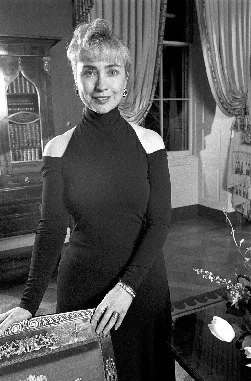 Hillary Clinton wearing 1992 cutout shoulder design by Donna Karan to her first state dinner as First Lady.