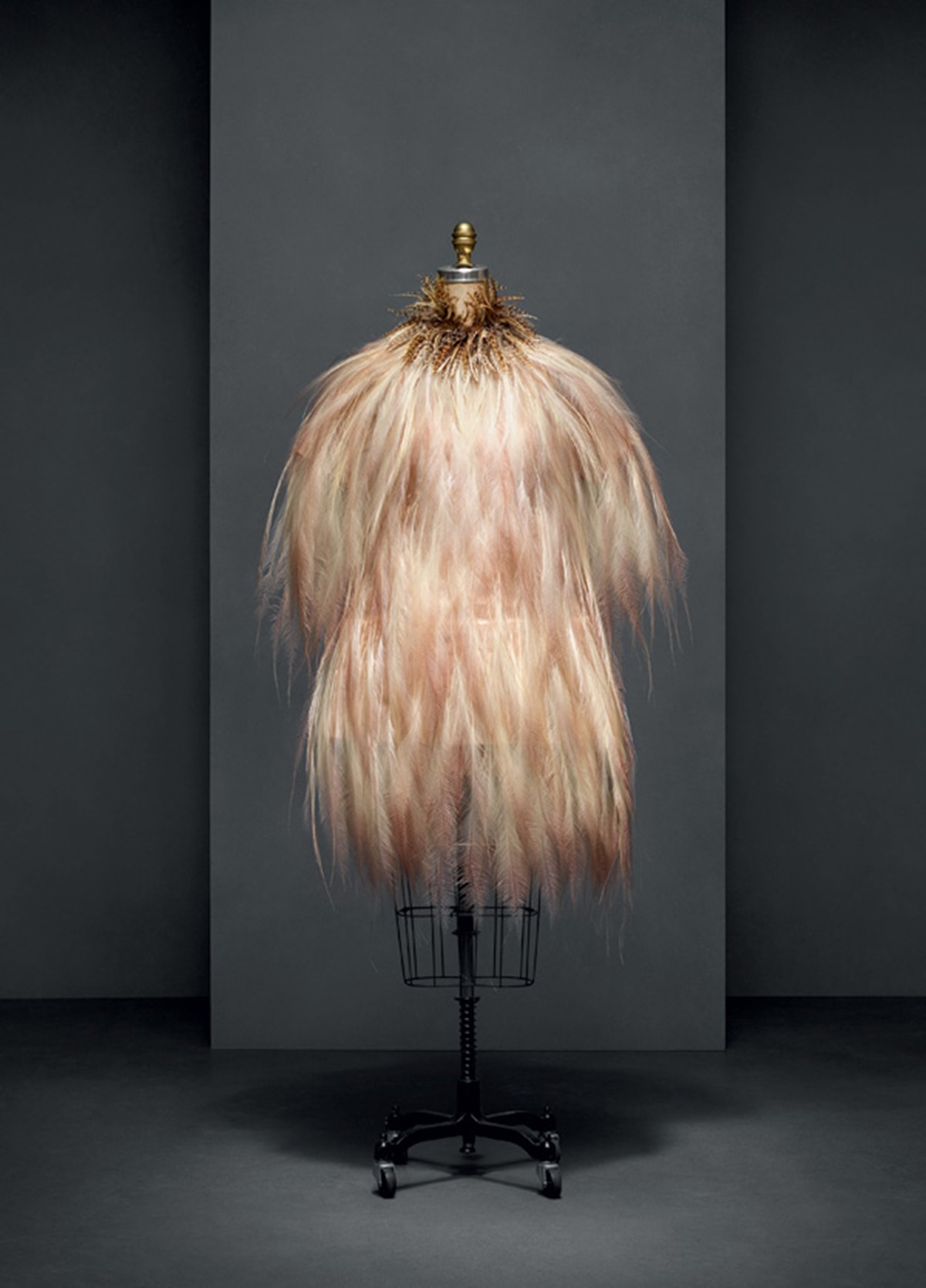 New York Calling: Yves Saint Laurent, Evening Dress, autumn/winter 1969-1970, Haute Couture Machine-sewn, hand-finished nude silk gauze, hand-glued with white, black, and brown bird-of-paradise feathers.