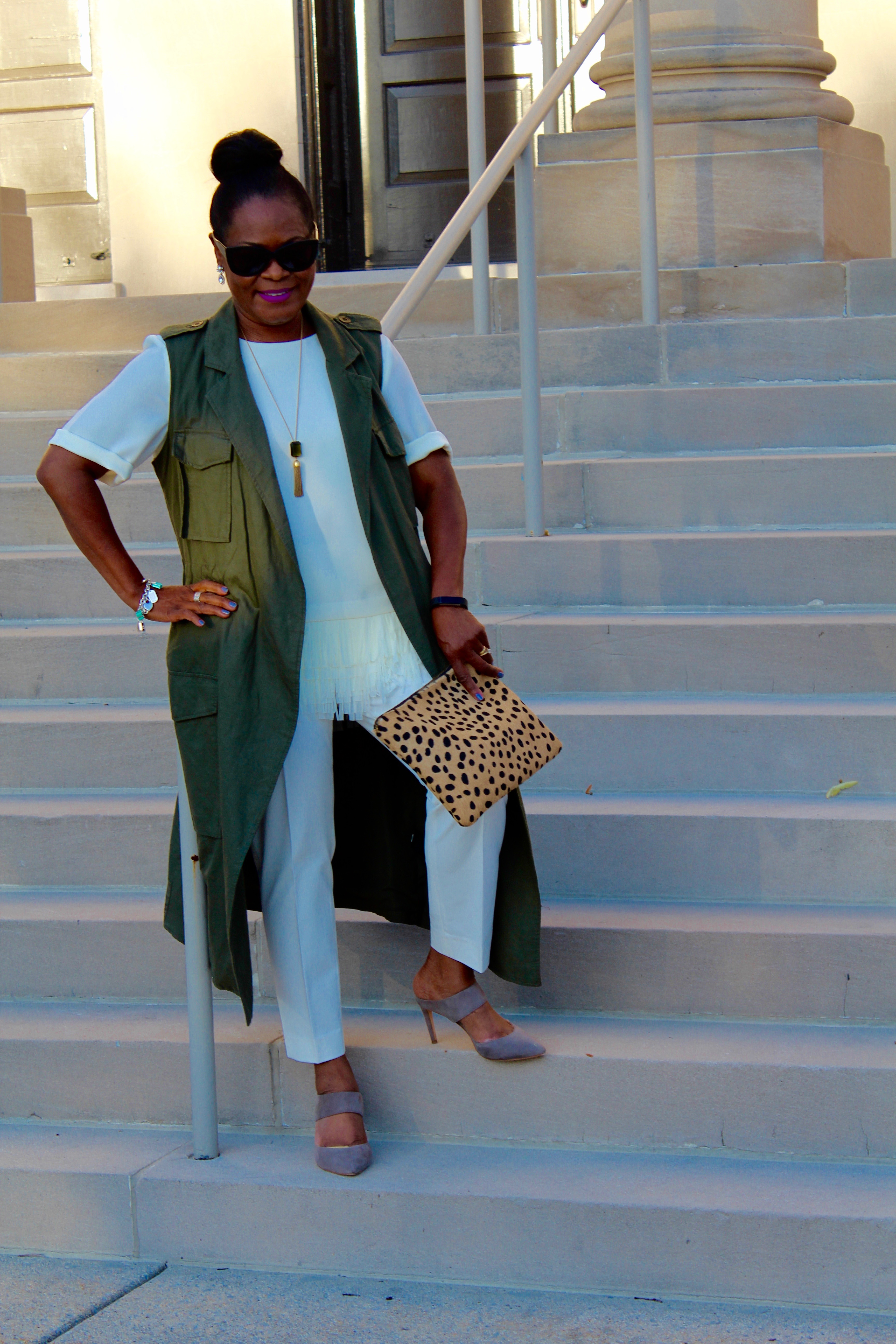 Wearing: Target Who What Where Collection Long Fatigue Vest, Banana Republic fringed top, J. Crew Pant, Boden Suede Slide with 2ChicDesigns calf-half clutch.