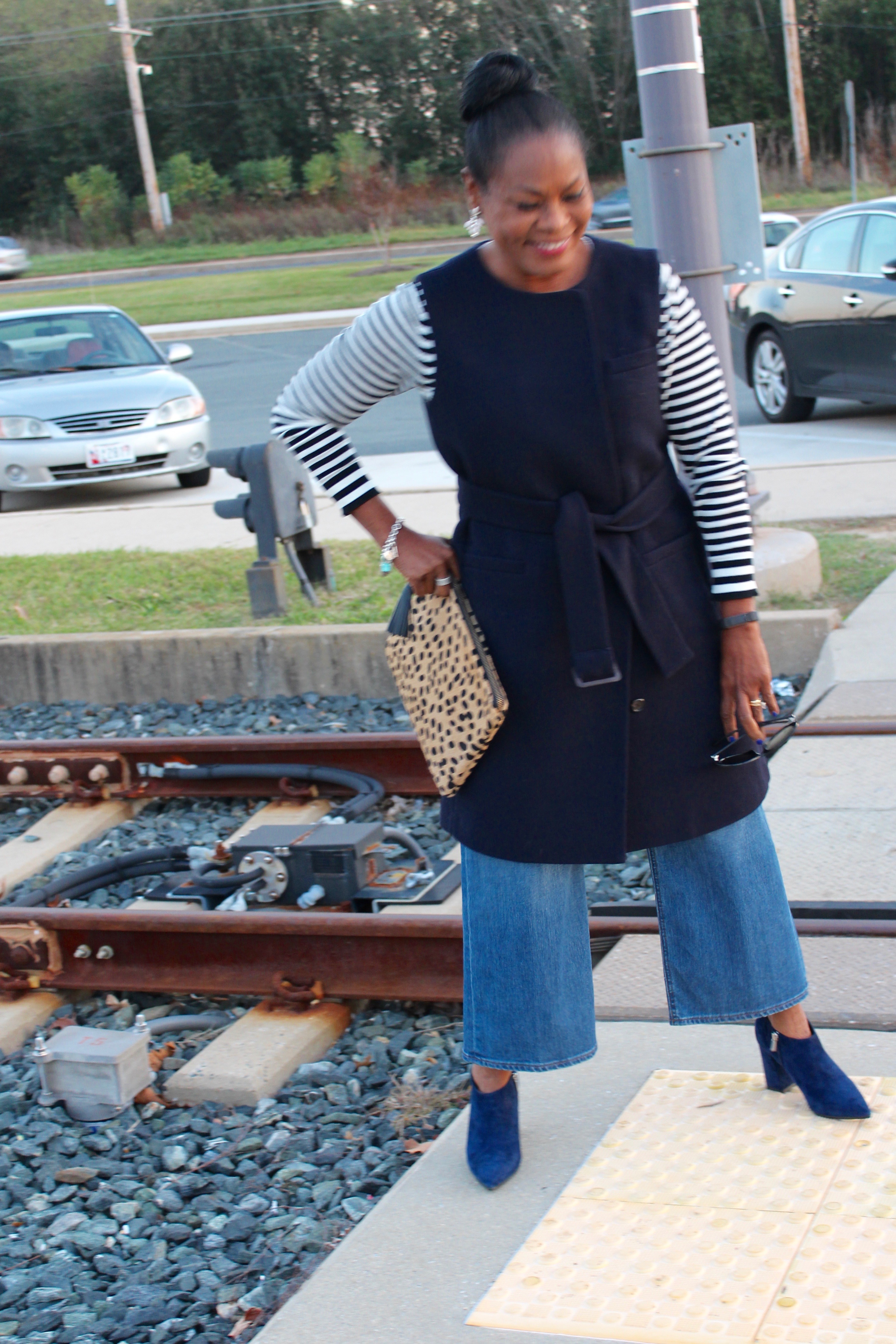 Location: Hunt Valley, Maryland Light Rail Train Station. Wearing: J.Crew Long Navy Wool Belted Vest, Target Who What Wear Perfect Crew, J.Crew Rayner jean, Marc Fisher "Jayla" Block Heel Navy Suede Bootie with 2ChicDesigns Calf-Hair Clutch.
