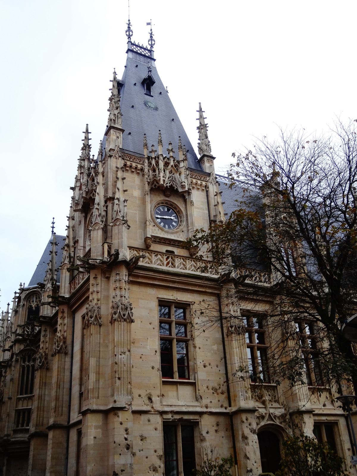 My Paris Trip, "'S Marvelous." Palais de Justice de Rouen proudly shoiwng it's battle scars from World War II bombings.