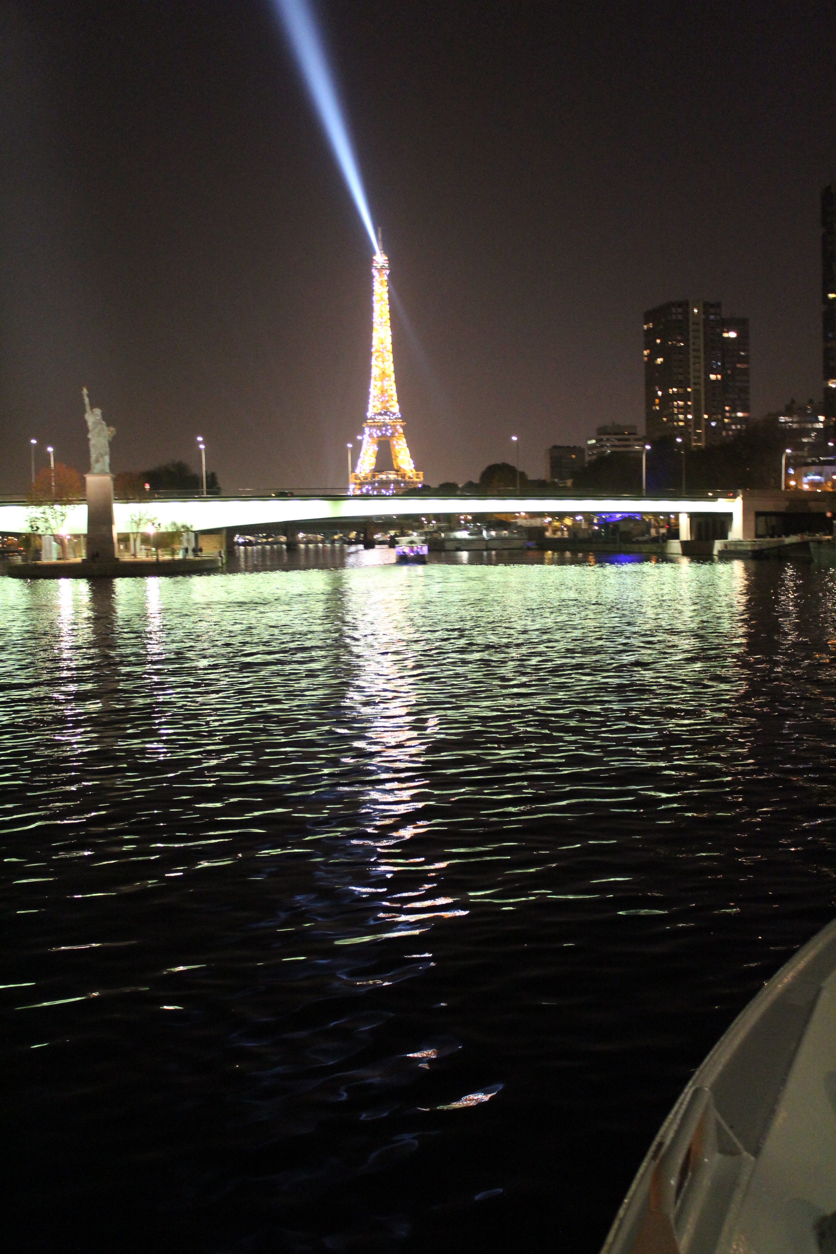  My Paris Trip was "S Marvelous." Ama Waterways Embarkation on Seine River Cruise, in view of the four Staute of Liberty's in Paris with the iconic EIffel Tower illuminated.