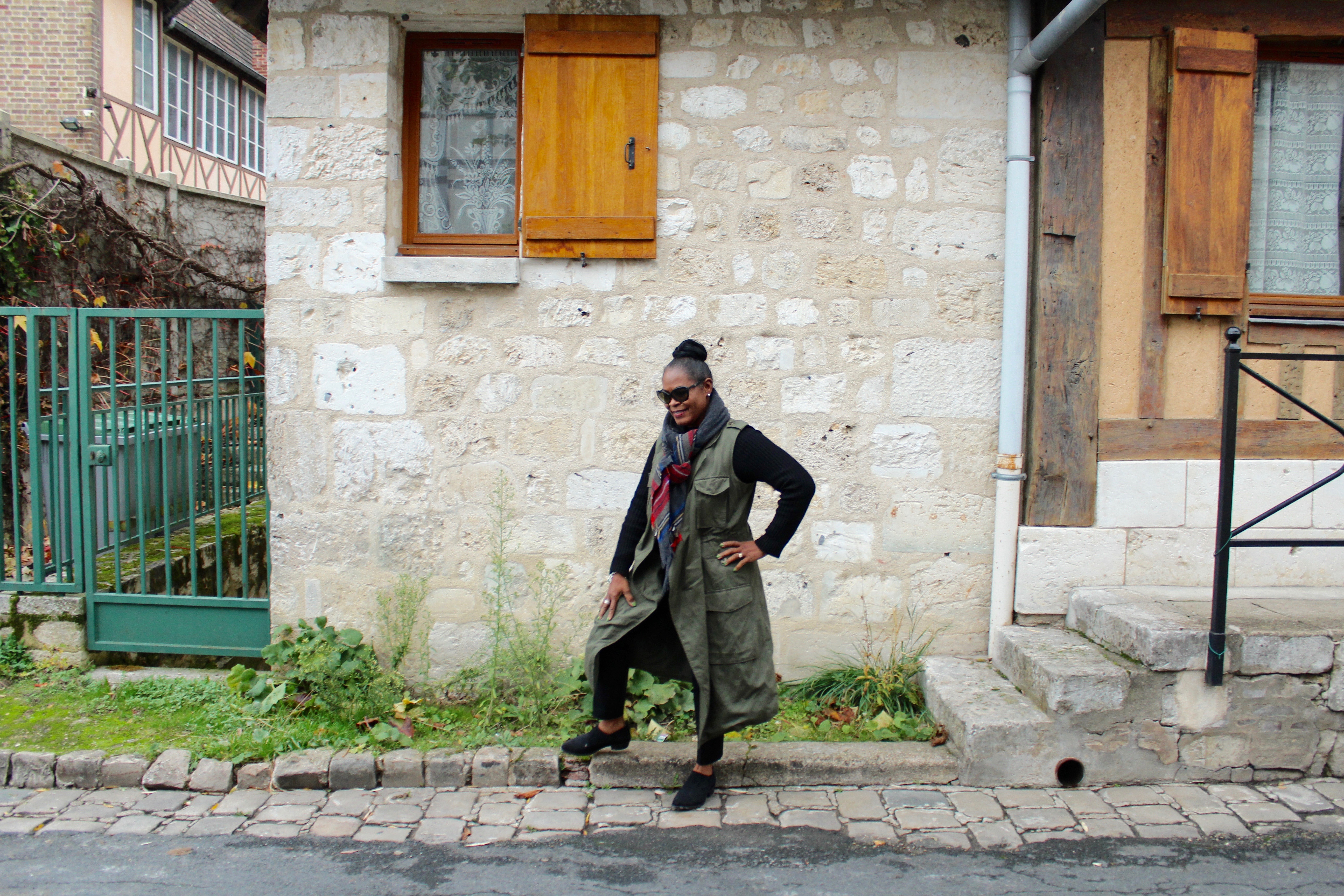 My Paris Trip "'S Marvelous." Location: Les Andelys. Wearing Target Who What Wear green tunic vest, J. Crew Wool Crew Sweater, my staple J. Crew Black Minnie Pant, J. Crew Oversized Wool Plaid Scarf, Frye Company Black Shootie with Prada sunnies.