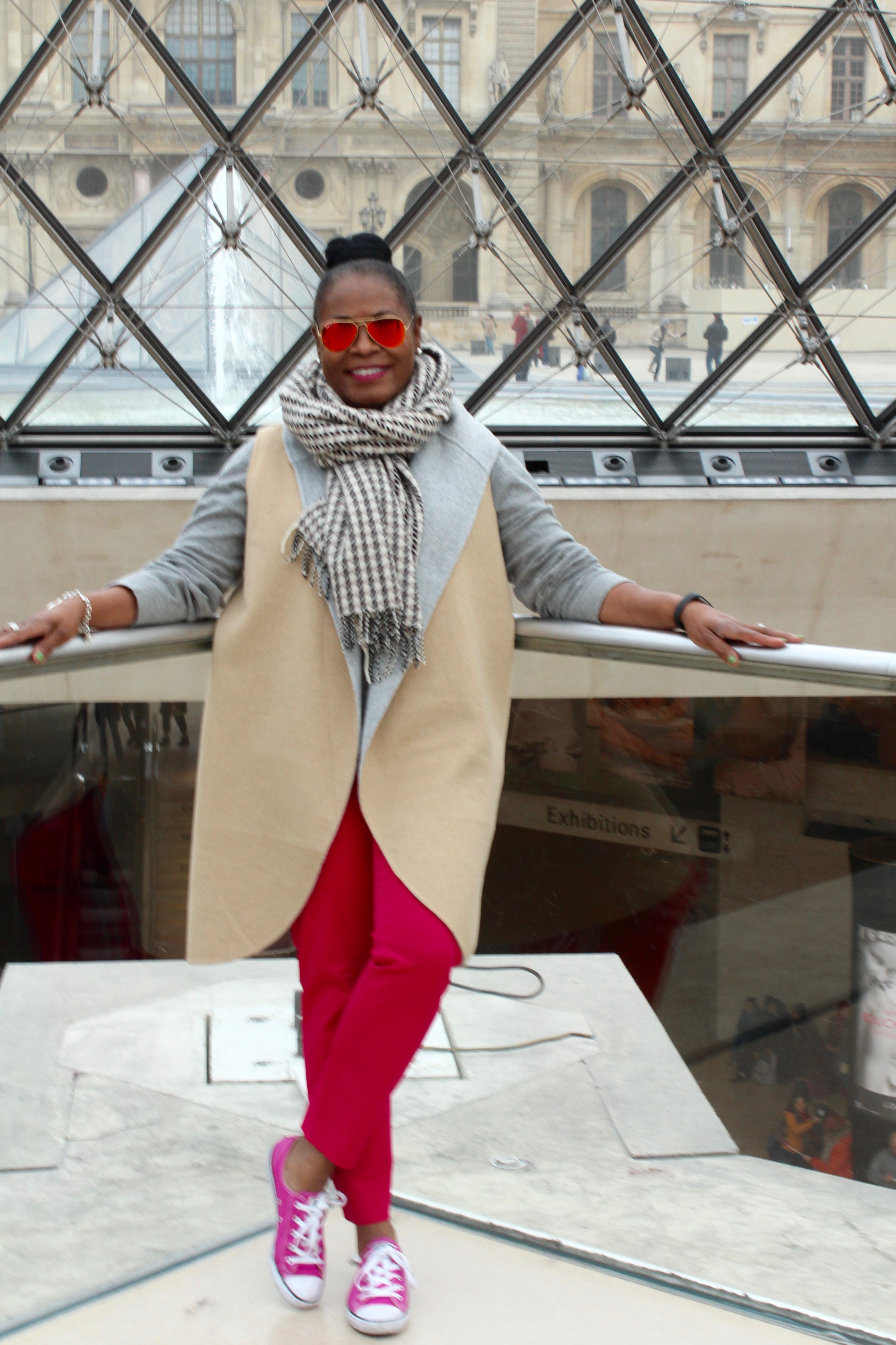 My Paris Trip, "'S Marvelous." Location: The Louvre. Wearing: Talbot's Reversible Long Coat Vest, J. Crew Oversized Wool Scarf, J. Crew MInnie Pant, J. Crew Factory Grey Crew Sweater, Converse Dainty Pink Chucks with Prada Aviators.