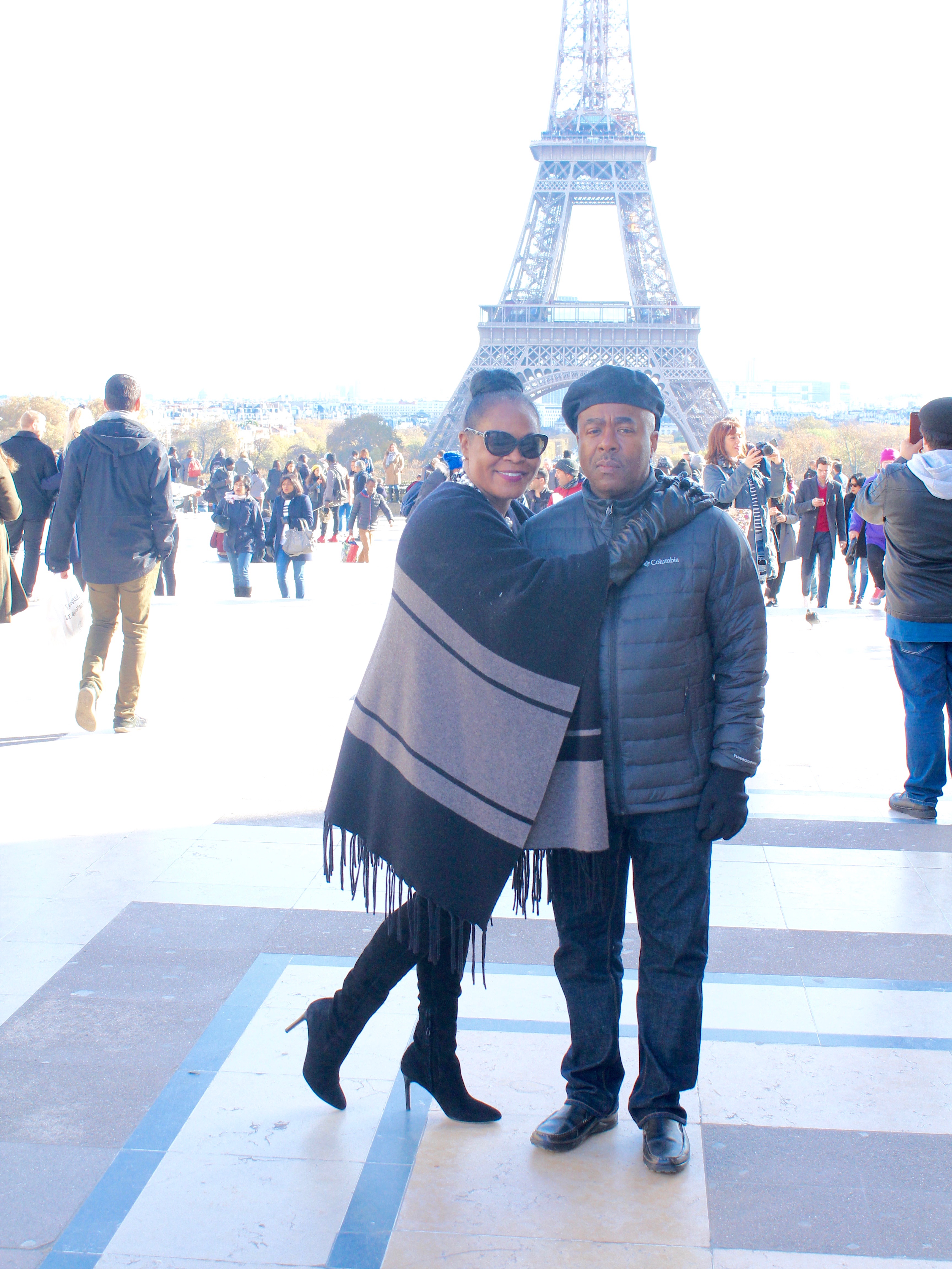 My Paris Trip, "'S Marvelous." Location: Trocadero area of Eiffel Tower, Paris, France. Wearing: Kokun Wool Fringed Poncho, Cole Haan Over-the-Knee Suede Boots with Prada sunnies.