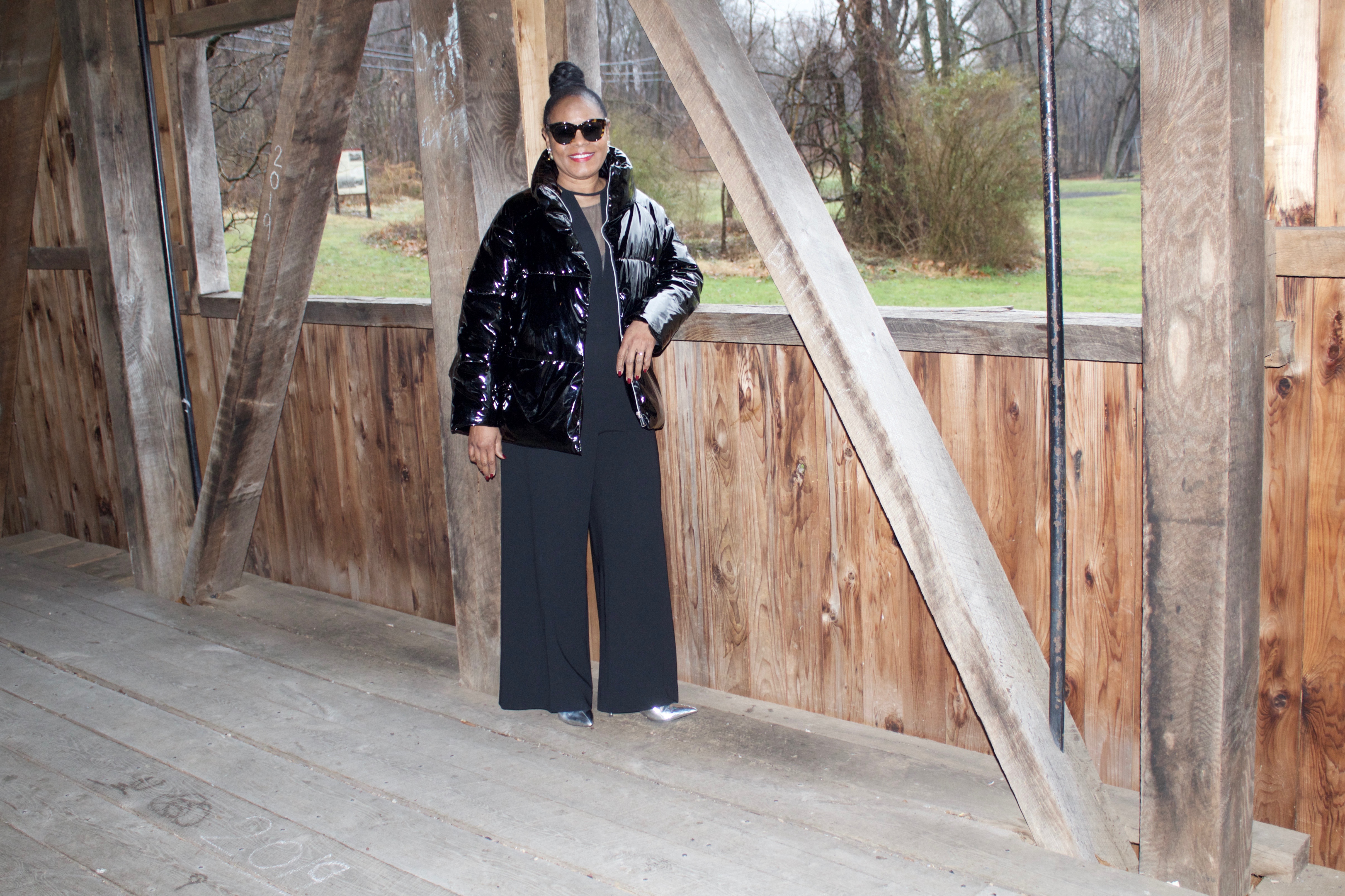Calvin Klein Puffer Jacket with Frascara Black Jumpsuit and ASOS Silver Booties