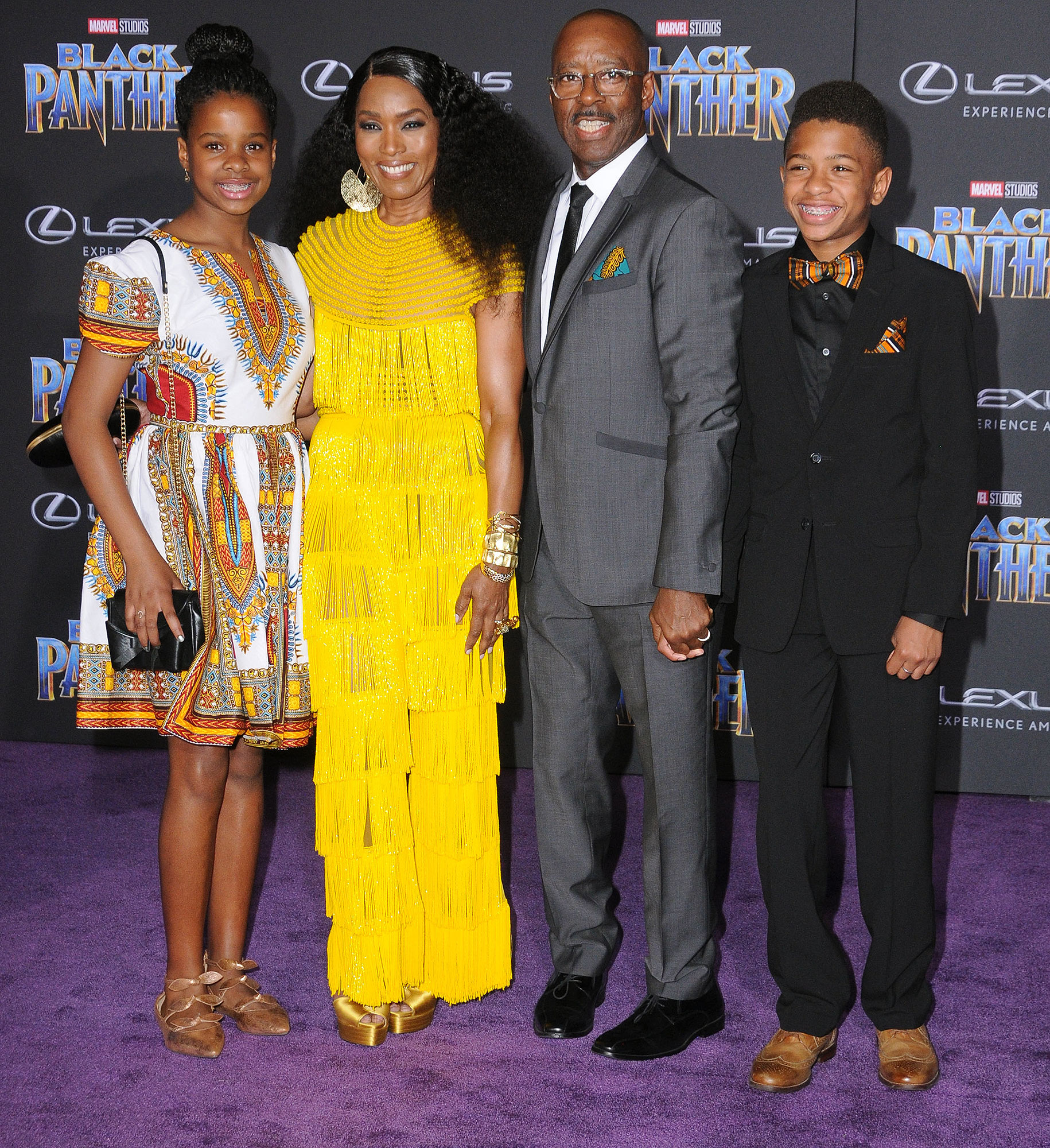 Splash News of Angela Bassett and family on red carpet opening night of superhero movie, Black Panther