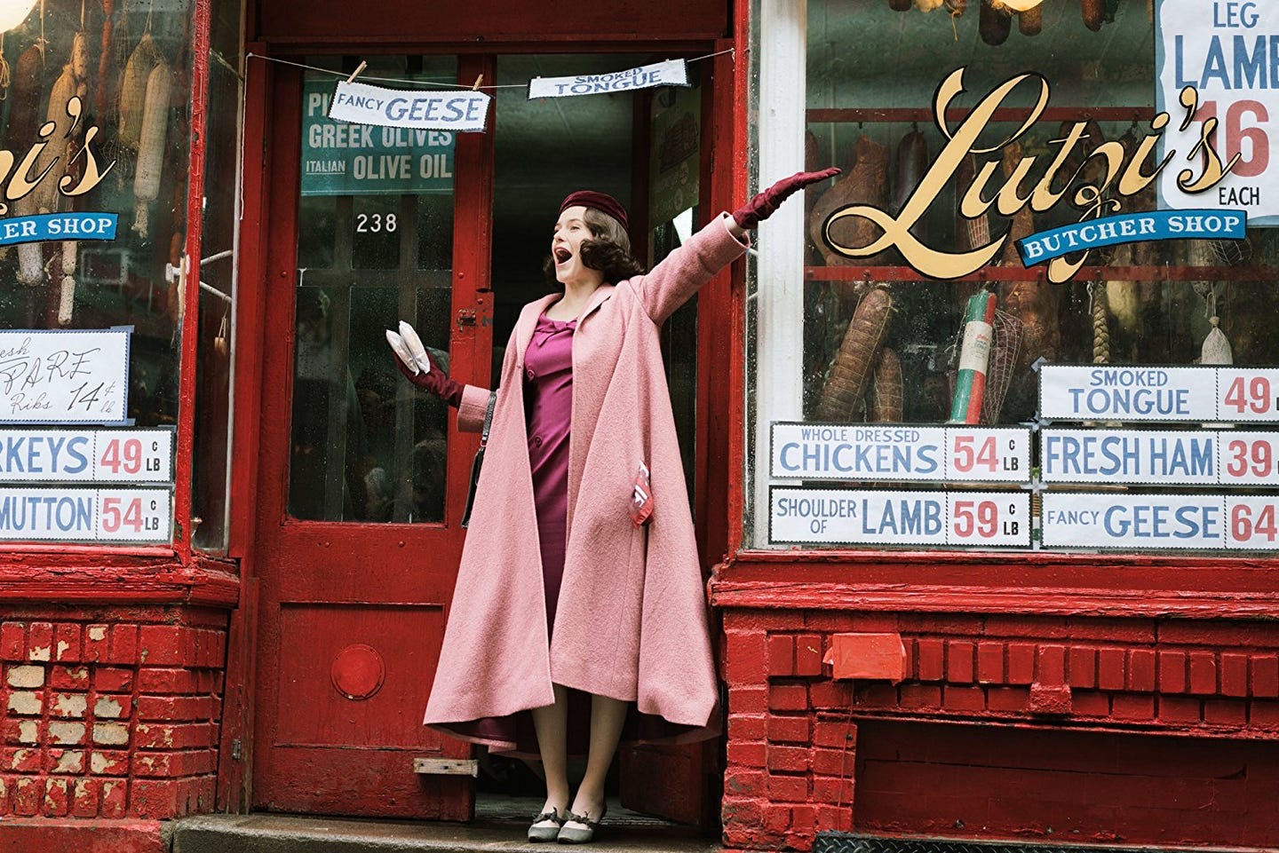 The Marvelous Mrs. Maisel leaving the butcher in Iconic Pastel Dream Swing Coat