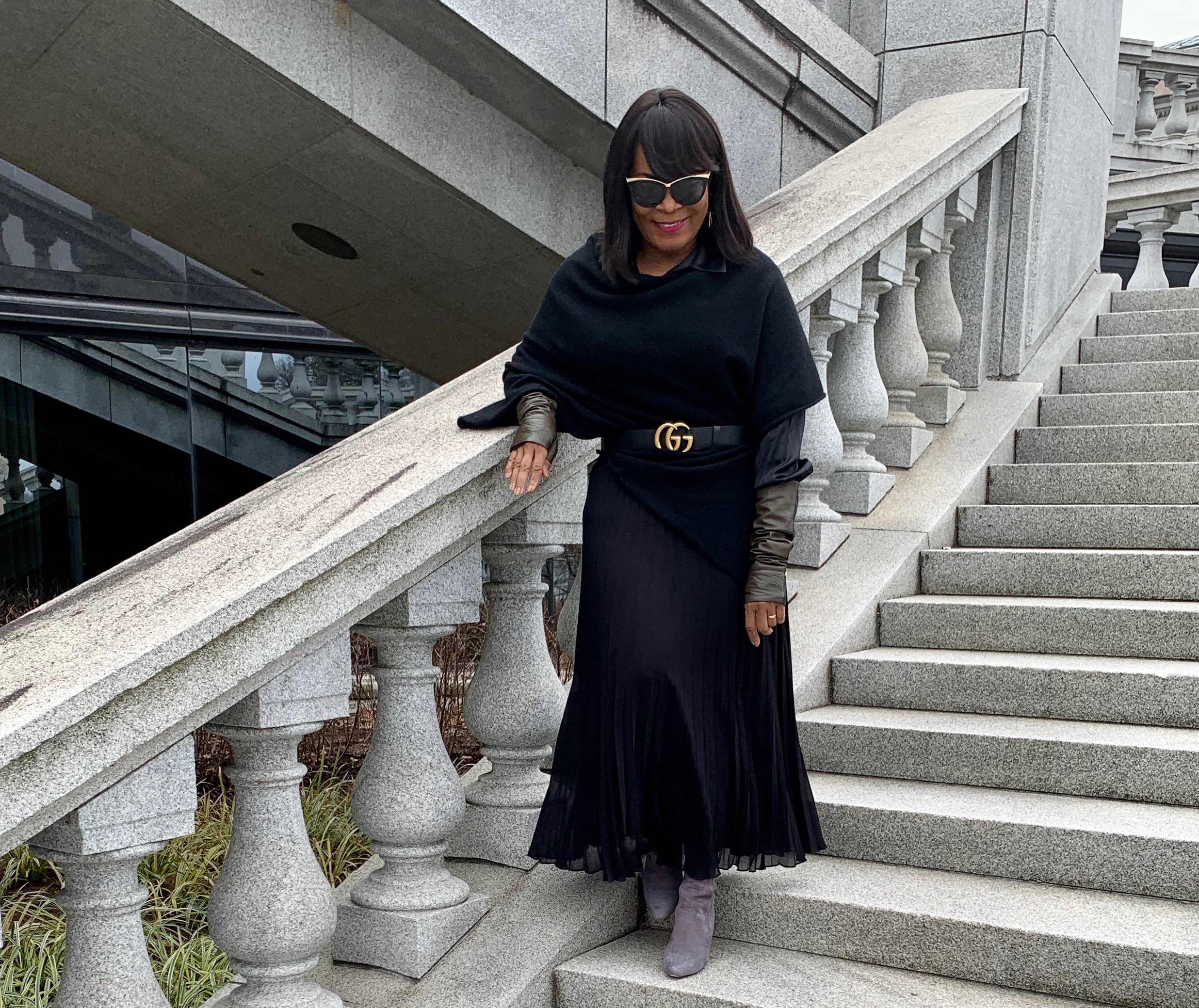 360 Cashmere Sweater with Gucci belt and pleated black skirt