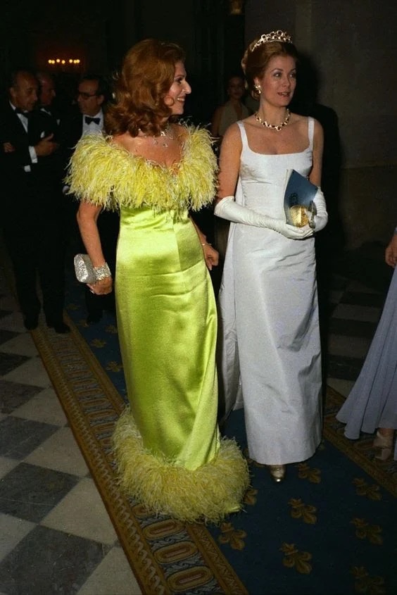 Princess Grace Kelly and Marie-Héléne de Rothschild wearing YSL