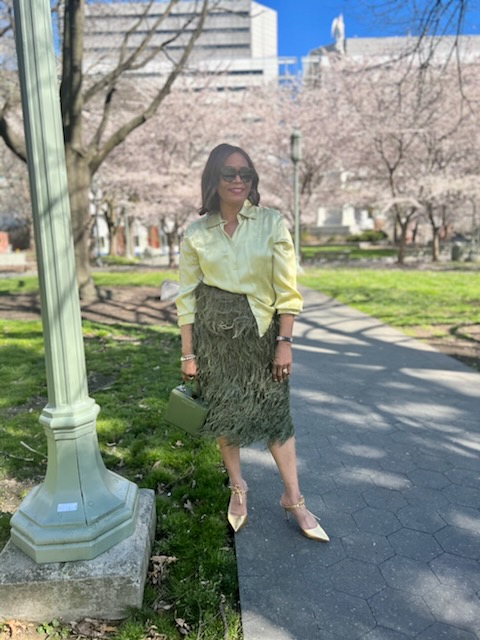 A Soft Silk Blouse with a feather skirt