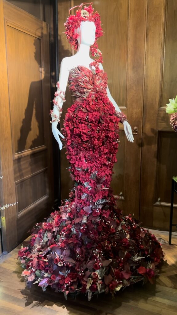 The Red Dress In the Music Room at Longwood Gardens Christmas Experience