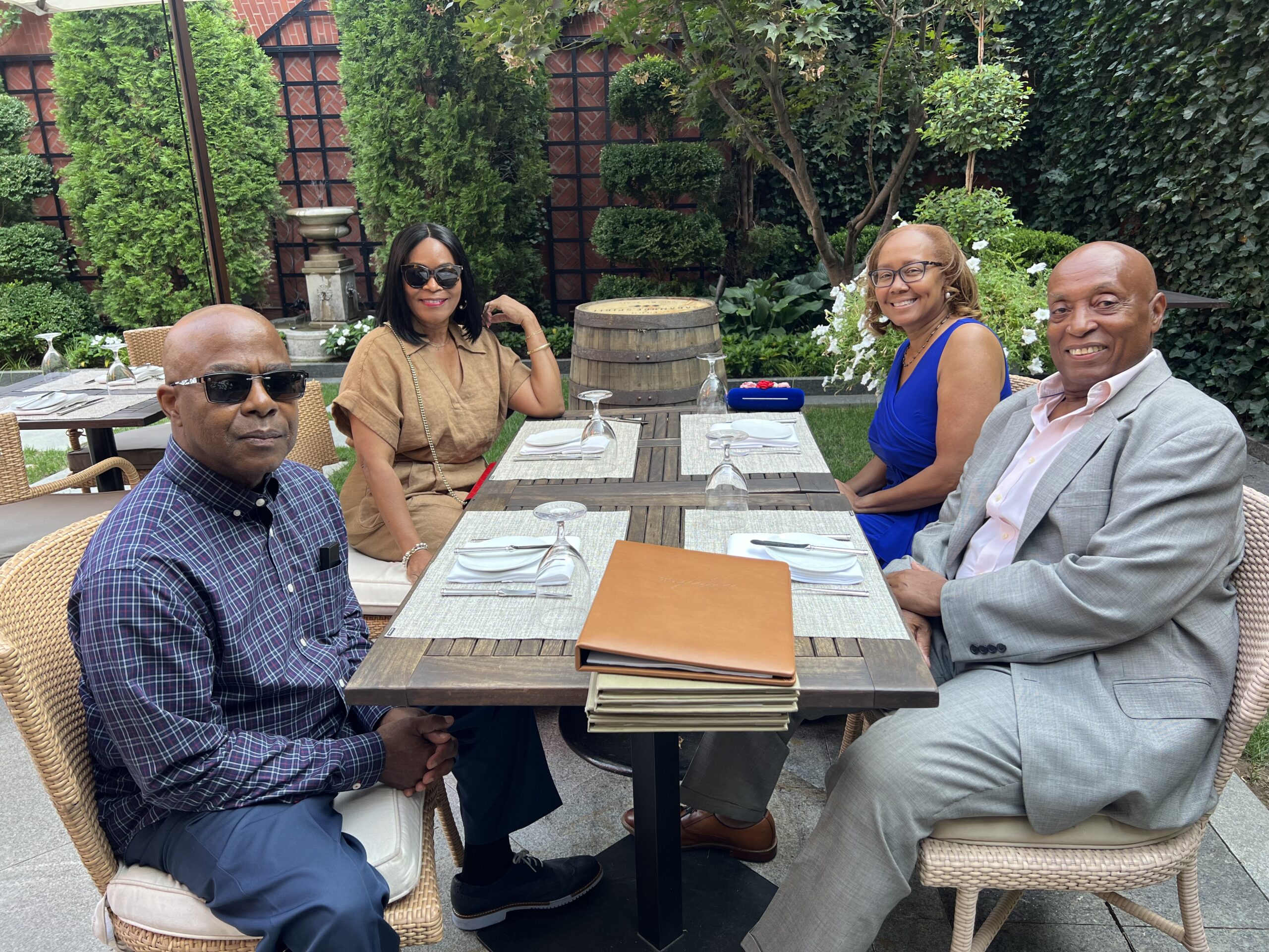 The Hargrove's and the Harold's alfresco dining in the Magdalena, a urban oasis in the charm city - Baltimore